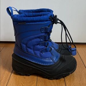 The North Face Blue and Black Winter Boots